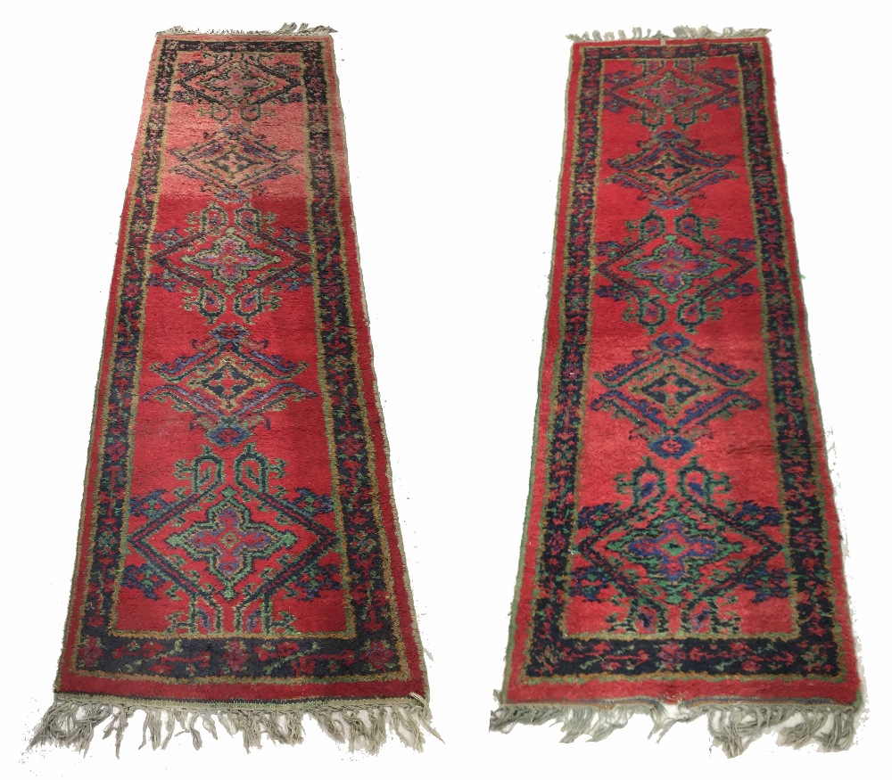 Pair of vintage runners, decorated with large foliate medallions within foliate border, 93" x 29" (