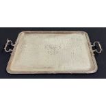 Large silver plated twin handled serving tray, with an engraved central monogram within a reeded