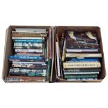 Two boxes of reference books relating to guns and firearms