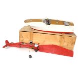 Fibreglass scale model pond motor boat, 31" long, (af) stand and crate; together with a partially