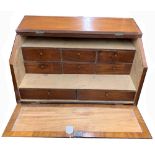 Mahogany table top stationary cabinet, the hinged fall front and raising top enclosing fitted