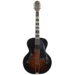 1950s Harmony Deluxe archtop guitar; Finish: sunburst, lacquer checking, heavy play wear,