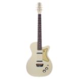 Danelectro 56-U2 electric guitar; Finish: Daddio yellow, minor marks; Fretboard: rosewood; Frets: