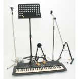 Yamaha PSR-18 keyboard; together with a selection of assorted music stands to include Dixon Music