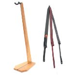 Ruach Music cherry wood guitar stand; together with three good quality leather guitar straps
