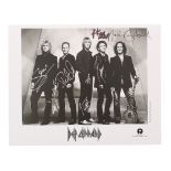 Def Leppard - autographed black and white promotional photograph, 8" x 10"