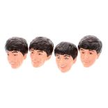 The Beatles - set of four plaster heads of the Fab Four