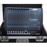 Studiomaster Powerhouse Vision 712 professional powered mixing console, within a heavy duty flight