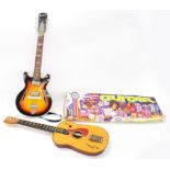 Vintage Chad Valley children's guitar, boxed; together with another Japanese made tin guitar bearing