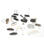 Selection of guitar pickups including two Fender Strat pickups