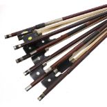 Eight various nickel mounted violin bows (8)