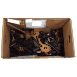 Large quantity of old stringed instrument fittings, including bridges, tailpieces, fingerboards etc