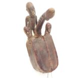 Interesting early 20th century African phallic tribal bow harp, with hide soundboard upon a carved