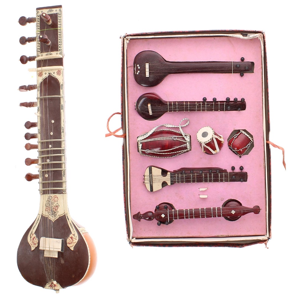 Miniature Indian sitar; together with a boxed set of miniature Indian musical instruments (2)