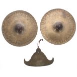 Antique Burmese spinning gong; together with a pair of brass French cymbals with turned wooden