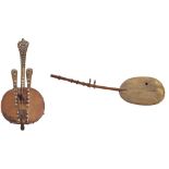 Interesting West African twelve string kora harp, with hide covered gourd back and decorated with