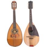 J.G. Winder bowl back mandolin; together with another bowl back mandolin with gilt sound hole