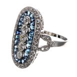 Attractive platinum diamond and sapphire ring set with five vertical graduated diamonds,