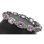 Attractive and fine modern 18ct white gold pink sapphire and diamond cluster line bracelet, the