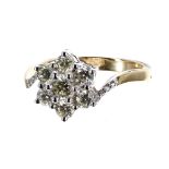 Modern 18ct yellow gold seven stone diamond daisy cluster ring, round brilliant-cut, estimated 1.