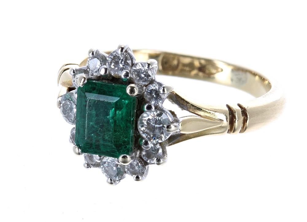 18ct emerald and diamond cluster ring, the emerald 0.66ct approx, in a setting of twelve diamonds, - Image 2 of 3