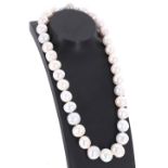 Large cultured pearl necklace with satin effect 9ct white gold ball clasp, the pearls each 13-14mm