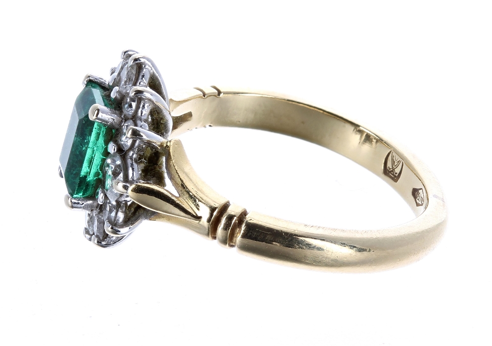 18ct emerald and diamond cluster ring, the emerald 0.66ct approx, in a setting of twelve diamonds, - Image 3 of 3