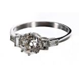 Art Deco style platinum diamond ring, set with an old-cut diamond with diamond set shoulders, the