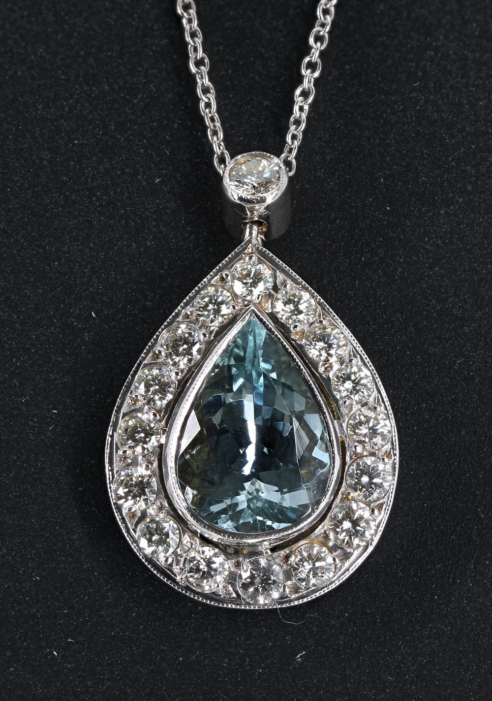 18ct white gold aquamarine and diamond pear shaped pendant on a slender necklace, the aquamarine 2.