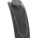 Rhodolite garnet 14k yellow gold necklace, set with six groups of three oval garnets an slender