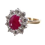 Good 18ct yellow gold oval ruby and diamond cluster ring, the oval ruby 2.25ct approx, in a
