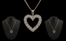 18ct White Gold Impressive Diamond Set Heart Shaped Pendant with attached 18 ct white gold chain.