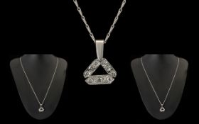 18ct White Gold - Attractive Diamond Set Pendant with Attached 9ct White Gold Chain.