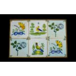 Antique Delft 18th Century Tiles. Six tiles enclosed within a wood frame.