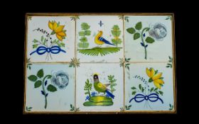 Antique Delft 18th Century Tiles. Six tiles enclosed within a wood frame.