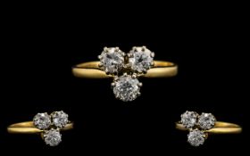 18ct Gold Attractive and Nice Quality Three Stone Diamond Ring in the form of a shamrock design.