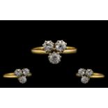 18ct Gold Attractive and Nice Quality Three Stone Diamond Ring in the form of a shamrock design.