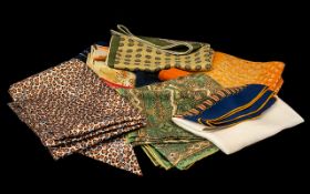 Collection of Vintage Scarves comprising five mixed material scarves: a cotton paisley print square