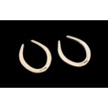 Pair Of Solid Silver Horse Shoes.