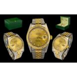 Rolex Oyster 18ct Gold and Steel Perpetual Datejust Gents Wrist Watch features a champagne dial,