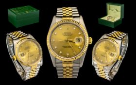 Rolex Oyster 18ct Gold and Steel Perpetual Datejust Gents Wrist Watch features a champagne dial,