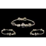 Pandora Bracelet. Pandora bracelet with various charms, please see accompanying image.