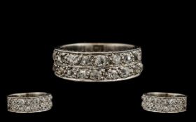 18ct White Gold Attractive Channel Set Diamond Ring - From the 1930's.Set with 20 old round