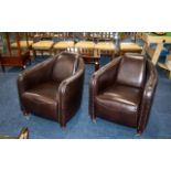 A Pair of Superb Quality Contemporary Leather Tub Chairs in aviator brown and with turned wood