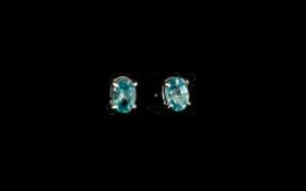 Blue Zircon Stud Earrings, two oval cut blue zircon solitaires, from zircon mines in Cambodia,