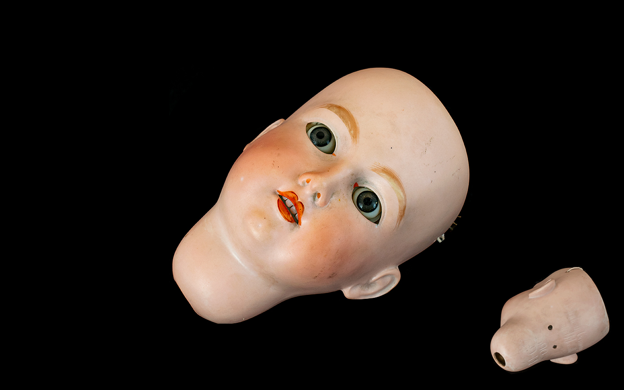 Armand Marseilles Porcelain Dolls Head - with blue paper weight eyes. Made in Germany. Numbered 390.