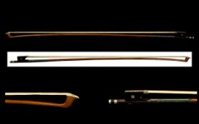 Antique Bow of typical form, the frog inlaid with mother of pearl, green leather pad and nickel