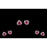 Ruby Solitaire Stud Earrings, round cut solitaire rubies totalling 1ct,