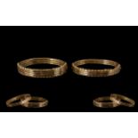 Victorian Period Pair of Attractive 9ct Gold Hinged Bangles (2). Wonderful patina. Each marked 9ct.