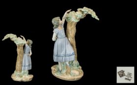 Nao by Lladro Handpainted Porcelain Figure titled 'Nest Discovery' of a girl pointing at a bird's